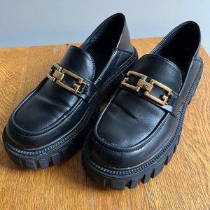 Lattelier Chunky Black Faux Leather Loafers with Gold Chain